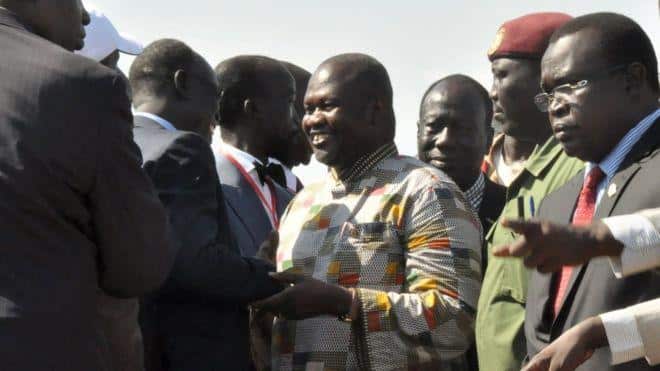 Riek Machar was greeted at the airport before heading to be sworn in as vice president