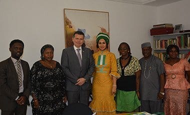 Sally Mbanefo with Switzerland Ambasaddor Eric Mayorac