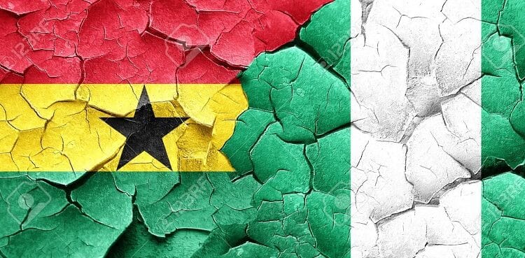 Ghana flag with Nigeria flag on a grunge cracked wall