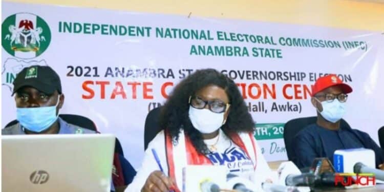 State Collation/Returning officer for the Anambra State governorship election, Prof Florence Obi (middle).