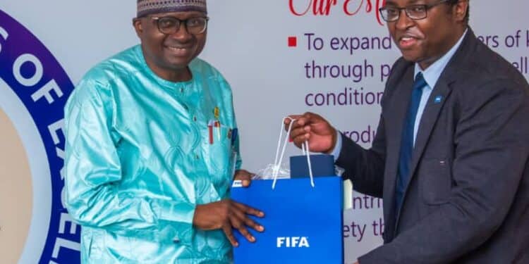UI Vice-Chancellor, Prof Kayode Adebowale, mni, Fas with the Group Leader, Development Programmes of FIFA, Mr. Solomon Mudege.