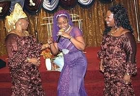 Apostle Bimpe dancing with friends