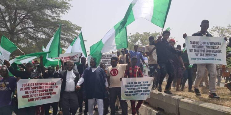 Protesters in Abuja Supreme Court New Naira Notes