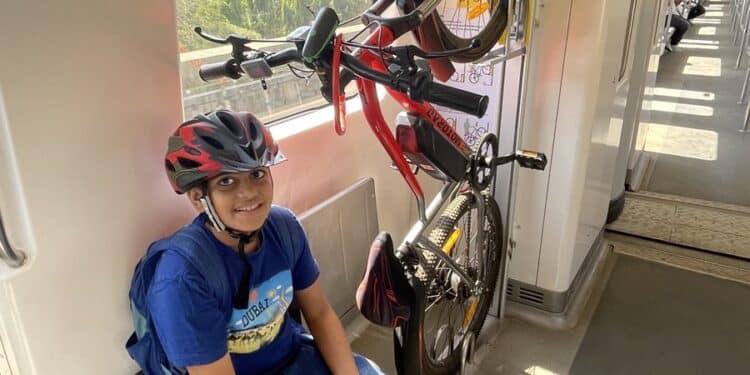 Boy Travesl with Bicycle on Mumbai metro