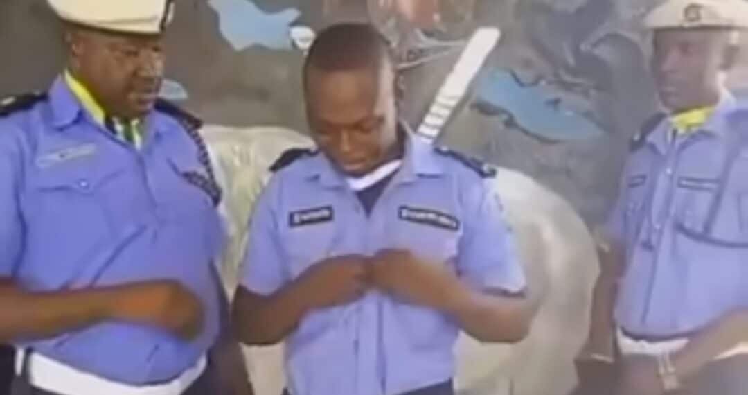 Police officer weeps