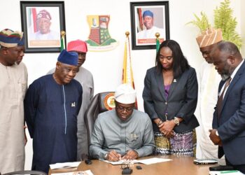 Oyo State Governor, Seyi Makinde (middle), signing the Executive Order on the Protection of Mining Communities against Insecurity and Exploitation in the State and the Executive Order on the Establishment of the Ministry of Culture and Tourism. With him from left are the Chief of Staff, Hon Segun Ogunwuyi (left); Deputy Governor, Barr Bayo Lawal; Chairman, Oyo State Minerals Development Agency, Hon Abiodun Oni; Secretary to the State Government, Prof Olanike Adeyemo; Commissioner for Culture and Tourism, Dr Wasiu Olatunbosun and the Attorney General and Commissioner for Justice, Barr Abiodun Aikomo, at the Governor's Office, Secretariat, Ibadan. PHOTO: Oyo Gov's Media Unit.