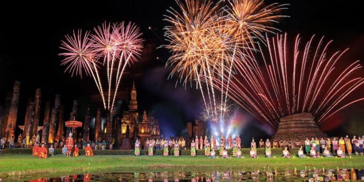 Traditional-Thai-in-Loy-Krathong-festival-showing-in-Wat-Mahathat-Sukhothai-historical-park-Thailand New Year